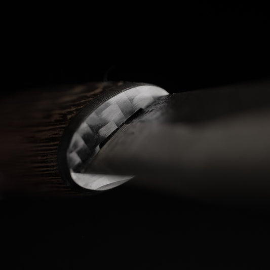 Roselli's limited edition knife "Carpenter knife black edition". Made from exclusive laminated carbon steel, wenge wood handle with carbon fiber ferrule. Comes with a handmade leather sheath in black. 