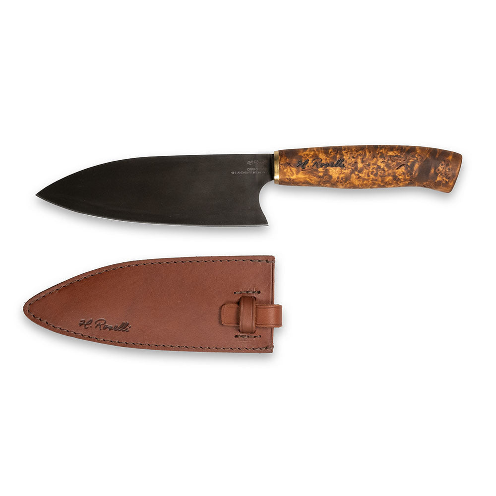 Handmade kitchen knife from Roselli, inspired by Japanese cuisine. Featuring a curly birch handle and a carbon steel blade, it comes with a handcrafted leather sheath.
